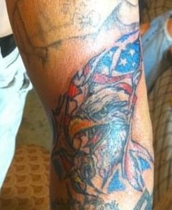 Neo traditional color tattoo of an eagle with American flag elements